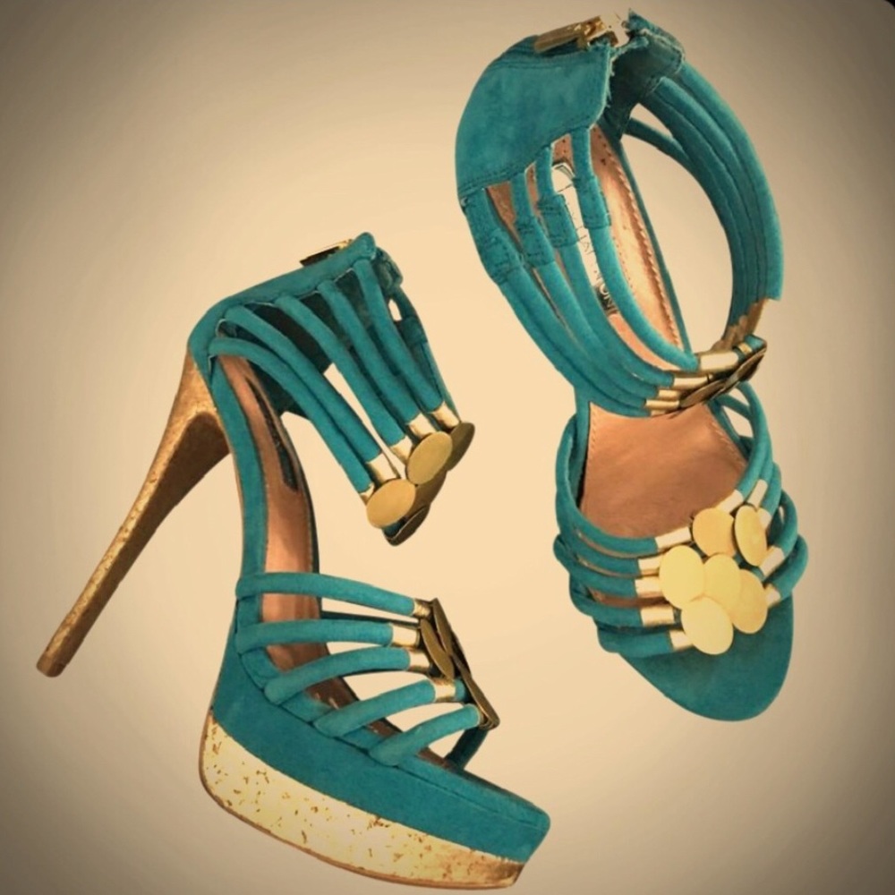 Halston sky-high platforms in teal suede with gold accents